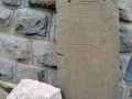 Hand carved ancient Cyrillic writing in marble stone at Villa Marija
