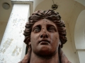Closeup of faces of statues in front of Villa Marija at Elenov Winery