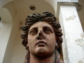 Closeup of faces of statues in front of Villa Marija at Elenov Winery