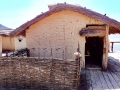 Homes on the Pile Dwelling Settlement at the Bay of the Bones at Plocha Mikov Grad on Lake Ohrid