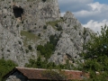 Stone cottage and rock monolith in Demir Kapija canyon