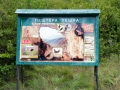 A sign for Peshna Cave A sign for Peshna Cave