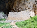 Medieval fortress at the opening of Peshna Cave Medieval fortress at the opening of Peshna Cave