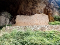 Medieval fortress at the opening of Peshna Cave Medieval fortress at the opening of Peshna Cave