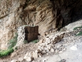 Medieval fortress at the opening of Peshna Cave Medieval fortress at the opening of Peshna Cave