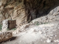 Medieval fortress at the opening of Peshna Cave Medieval fortress at the opening of Peshna Cave